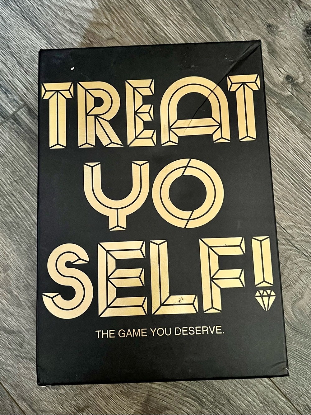 Buffalo Treat Yo Self Board Game Black and Gold